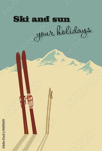 Winter  background. Mountains and ski equipment in the snow