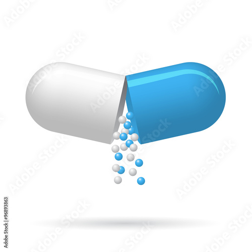 Opened medical pill with fall out pellets