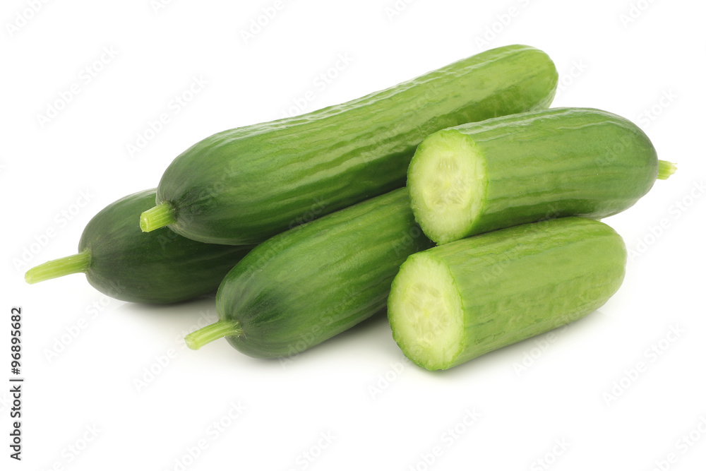 fresh green snack cucumbers on a white background fresh green snack cucumbers on a white background