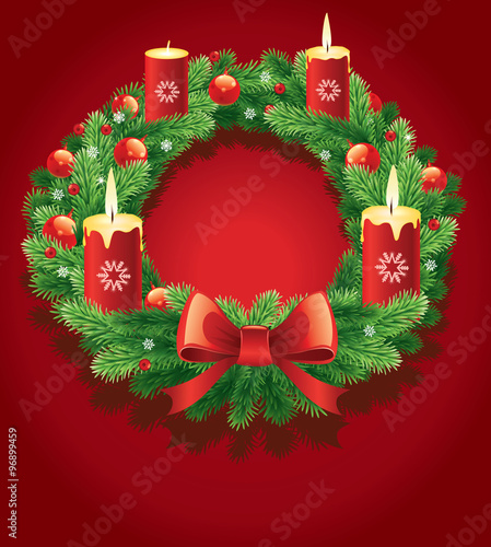 Advent wreath with burning candles for the pre Christmas time
