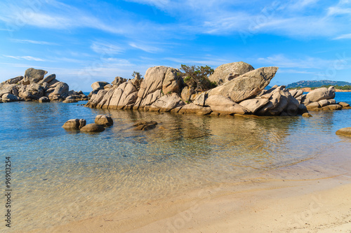 Rocks in sea water on Palombaggia beach, Corsica island, France