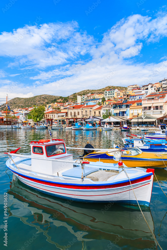 Traditional colourful Greek fishing boat in Pythagorion port, Samos island, Greece