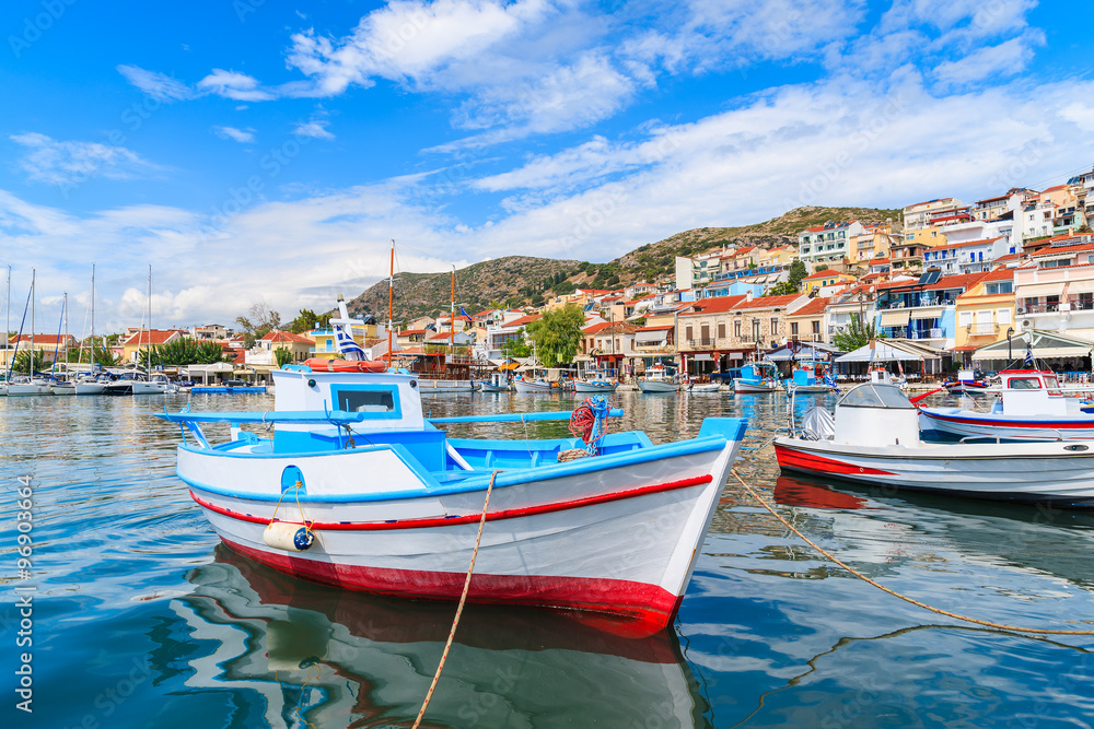 Traditional colourful Greek fishing boat in Pythagorion port, Samos island, Greece