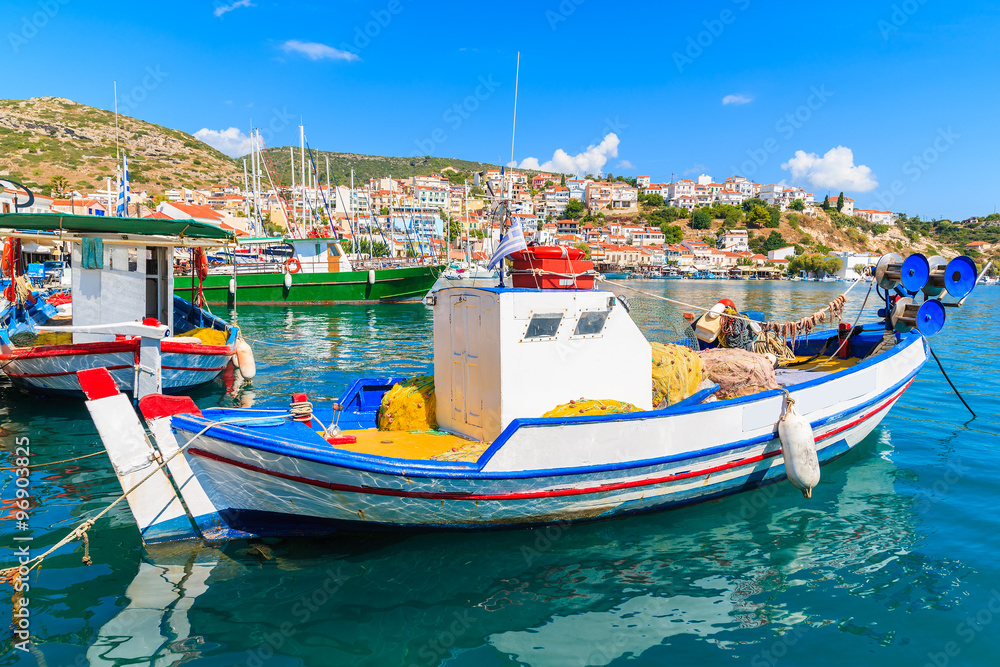 Traditional Greek fishing boat in Pythagorion port, Samos island, Greece Traditional Greek fishing boat in Pythagorion port, Samos island, Greece
