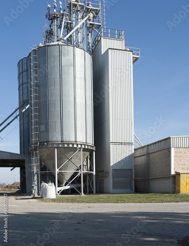 Farm with silo and storage space and some machinery