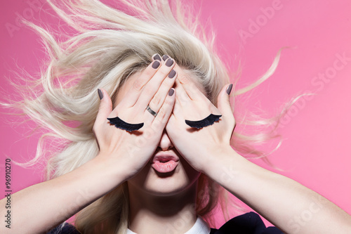 Girl with closed eyes painted on hands Fototapet