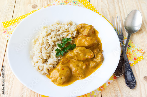 Chicken cooked in paprika and cream sauce, with ingredients