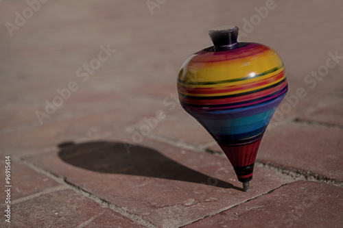 Trompo: Famoso juguete de nuestra infancia, el trompo de colores hecho en Teocaltiche, México photo
