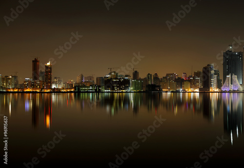 A beautiful view of Bahrain skyline during night and its reflect
