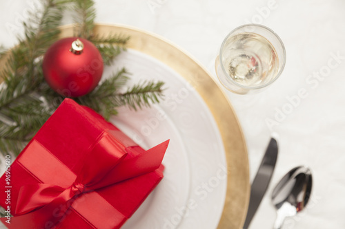 Christmas Gift with Place Setting at Table