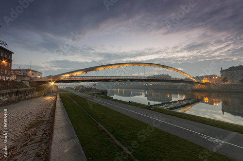 Bernatka footbridge over Vistula river in Krakow early morning #96916458