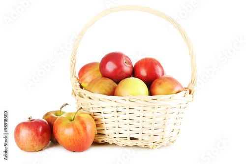 Fresh apples in basket isolated on a white