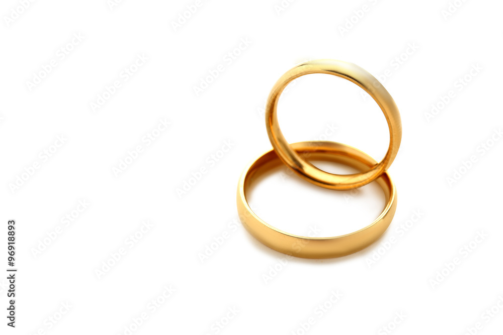 Golden wedding rings isolated on a white Golden wedding rings isolated on a white