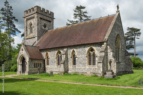 Church of Saint Barnabas, a 19th Century English Parish Church in Faccombe, Hampshire England on a summers afternoon.