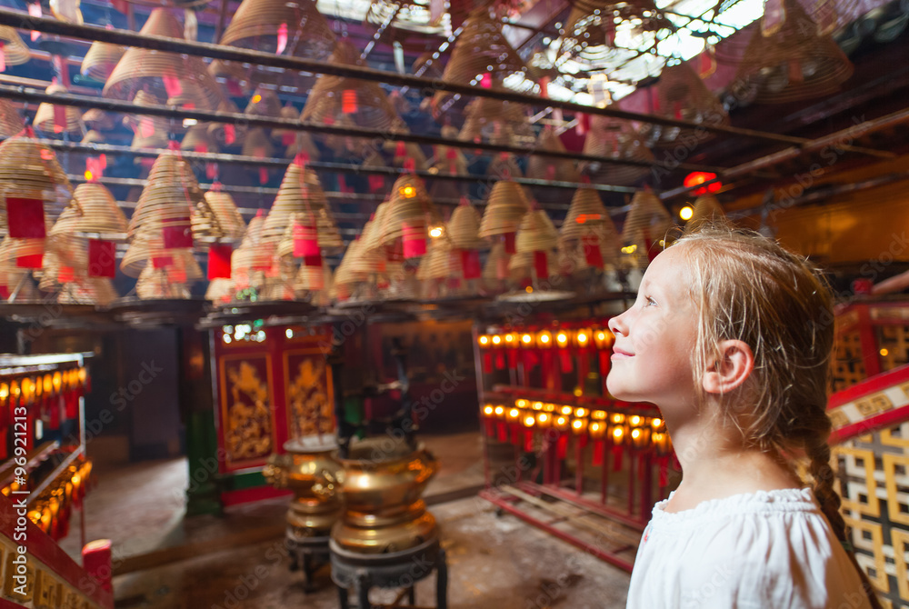 Little girl in Man Mo temple