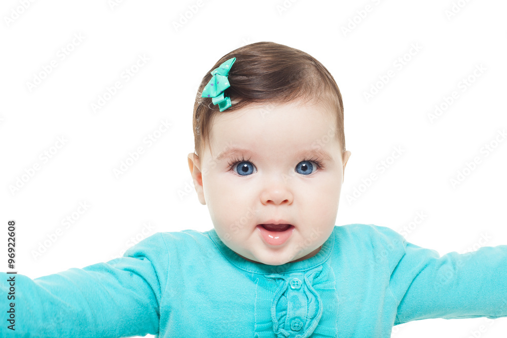 Baby girl sitting in studio on white background Baby girl sitting in studio on white background