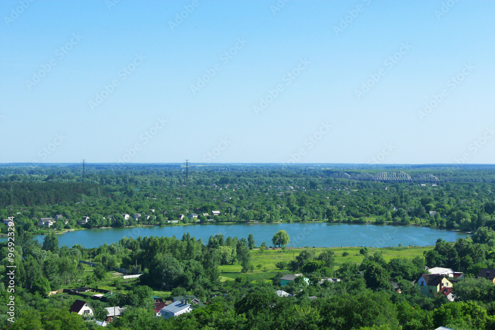 view to country houses at picturesque lake