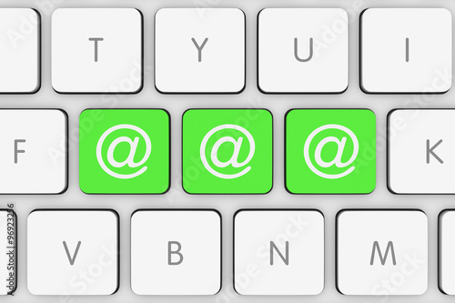 Green Email Icons on White Computer Keyboard