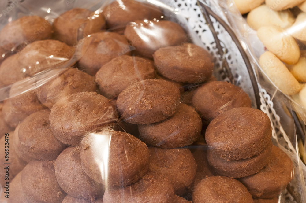 close-up of cookies with chocolate or almonds in a pastry close-up of cookies with chocolate or almonds in a pastry