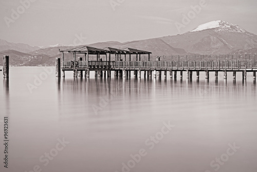 Wooden jetty with penthouse on lake