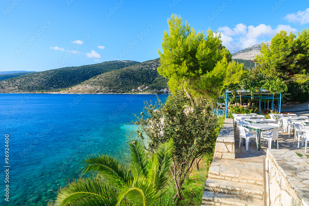 Naklejka premium Greek tavern restaurant on coast of Kefalonia island in Agia Efimia, Greece