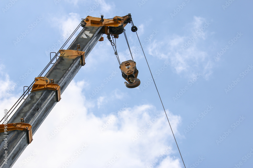 Lifting crane on blue sky background in industry atmospheric Lifting crane on blue sky background in industry atmospheric