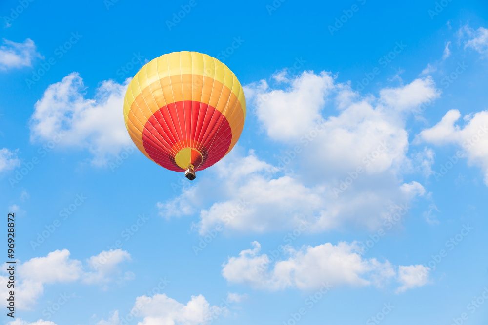 Colorful hot air balloon with blue sky background Colorful hot air balloon with blue sky background
