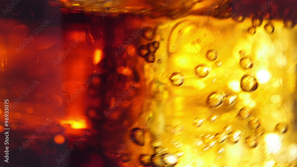 Cola pouring into a glass with ice cubes. Сlose-up 4K UHD 2160p.
Cola pouring into a glass with ice cubes. Сlose-up 4K UHD 2160p.