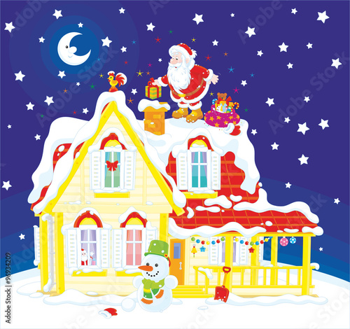 The night before Christmas, Santa Claus putting his holiday gifts in a chimney on a snow-covered roof of a house