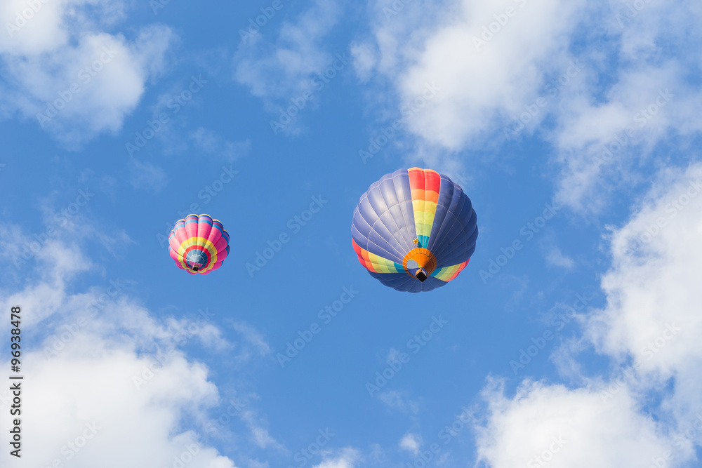 Fototapeta premium Colorful hot air balloon on blue sky