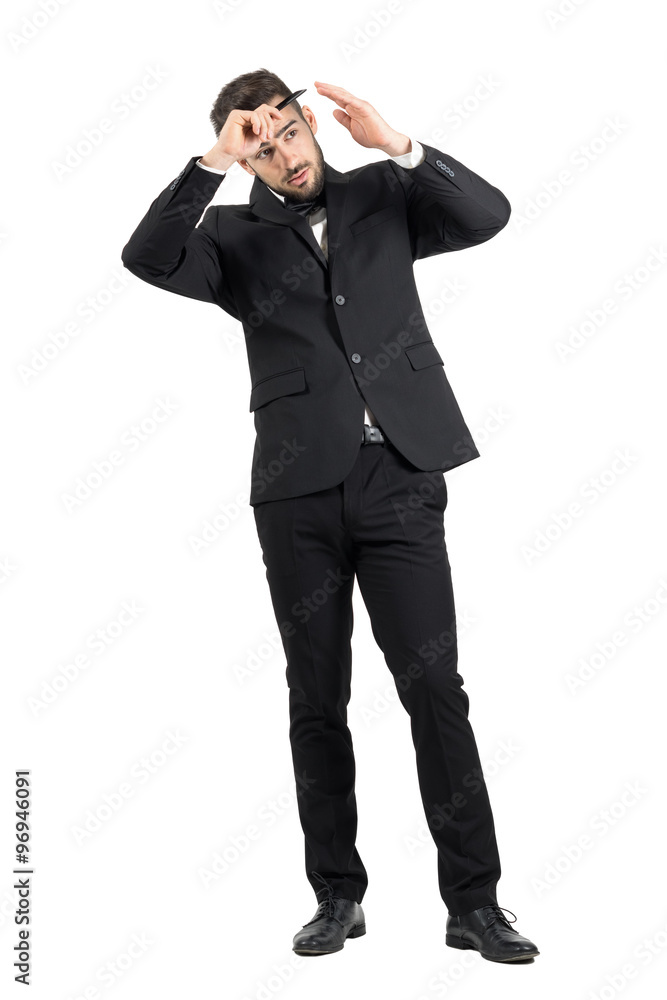 Preparation of elegant young groom combing his hair. Full body length portrait isolated over white studio background. Preparation of elegant young groom combing his hair. Full body length portrait isolated over white studio background.