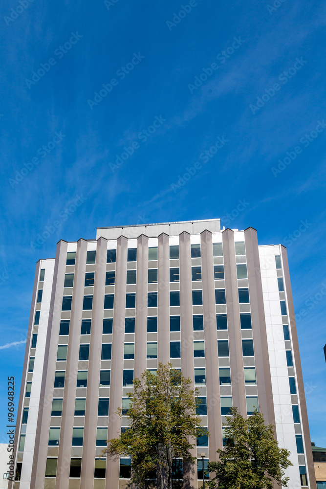 Grey Building Under Blue Skies