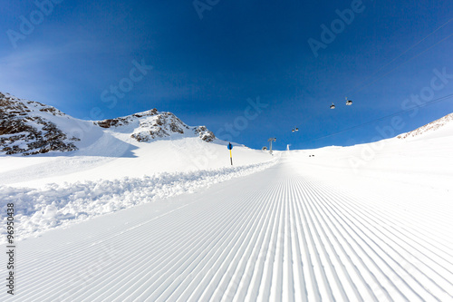 Groomed ski run at ski resort