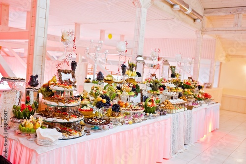 Wedding reception. Table with fruits and sweets