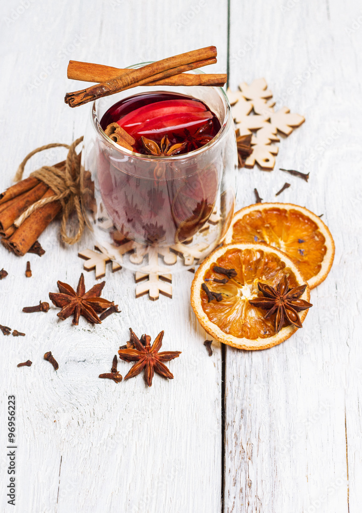Fototapeta premium Christmas mulled wine on a white rustic wooden table