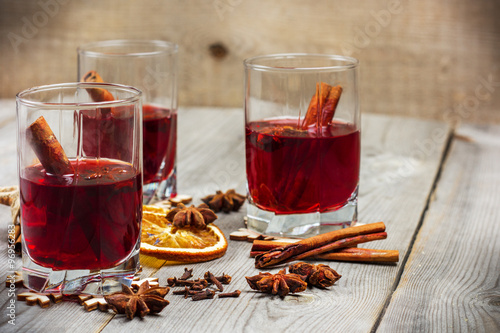 Christmas mulled wine on a rustic wooden table