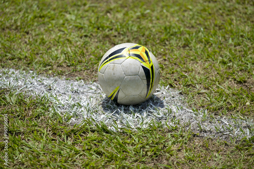 Soccer ball in the center of the pitch