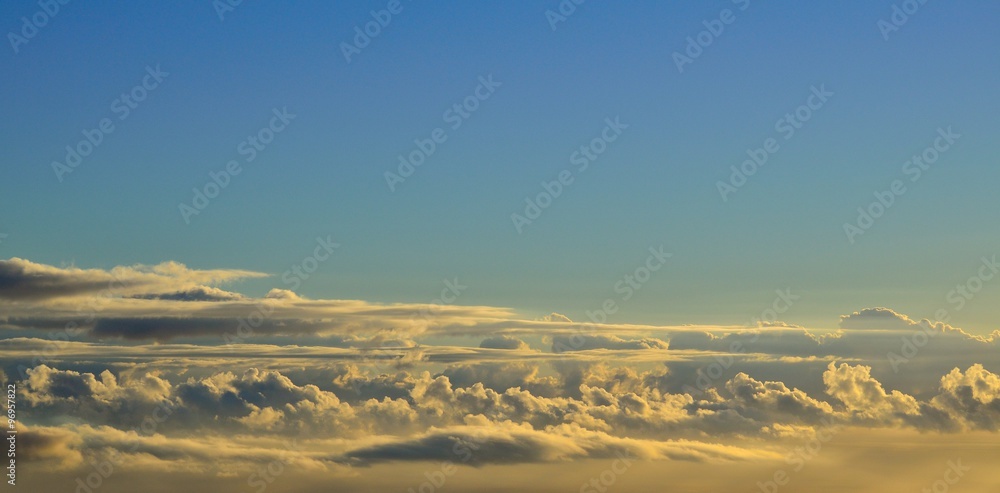 Autumn clouds with blue sky background