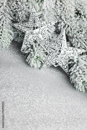Fototapeta Naklejka Na Ścianę i Meble -  branch of Christmas tree with stars