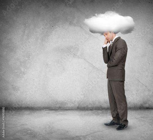 Sad man with cloud above head, looking down