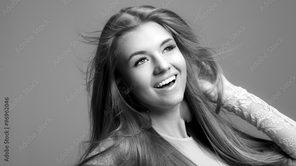 Fototapeta premium Portrait of a beautiful smiling woman