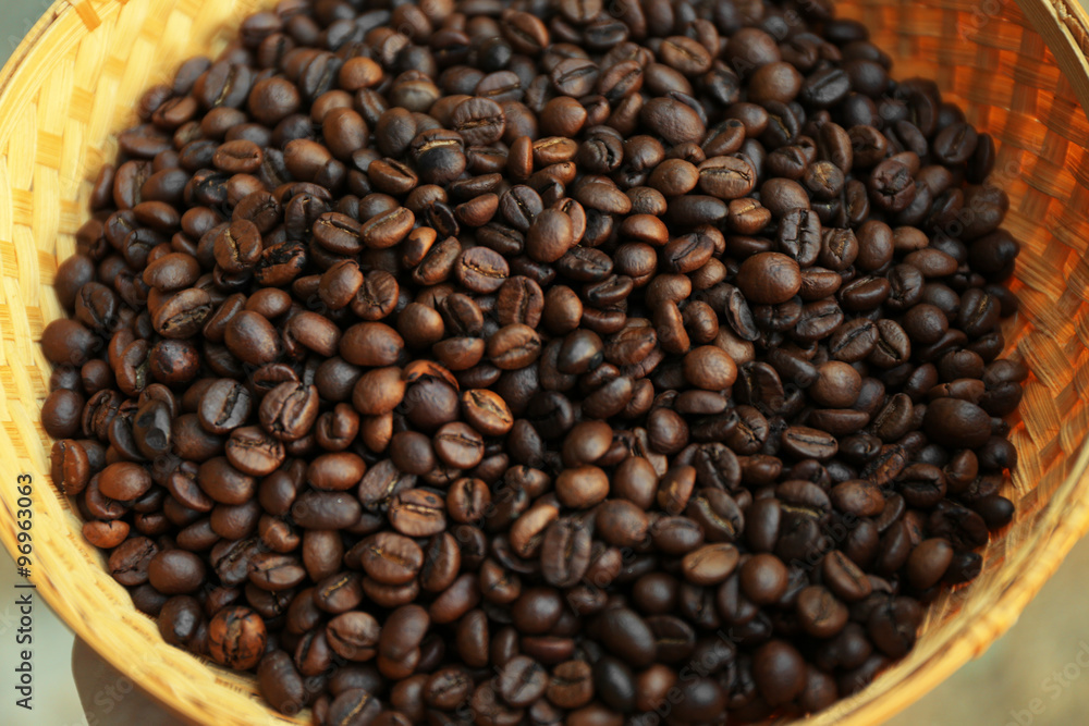 Roasted coffee beans in wattled basket Roasted coffee beans in wattled basket