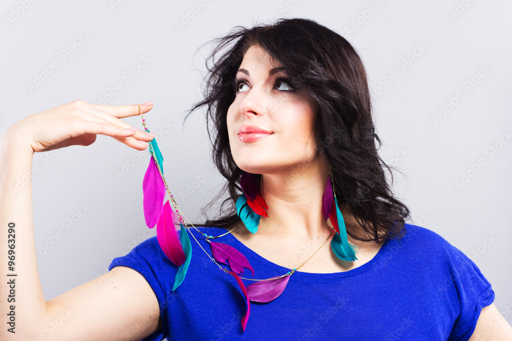 Beautiful brunette in a blue T-shirt.Bright accessories. Nice clothes. Shopping.Face portrait of smiling woman.
Beautiful brunette in a blue T-shirt.Bright accessories. Nice clothes. Shopping.Face portrait of smiling woman.