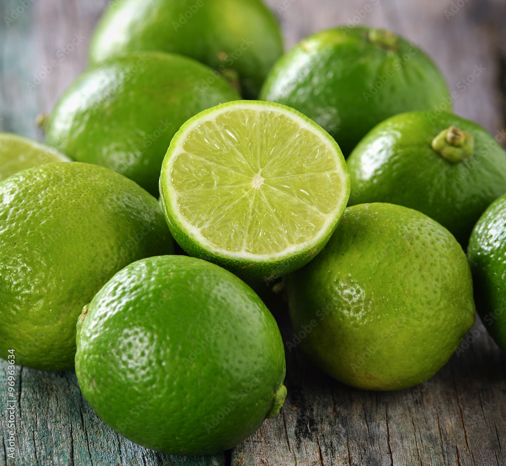lime on wooden table lime on wooden table