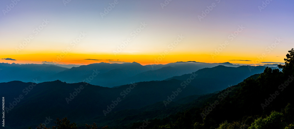 Sunset in the mountains landscape with sunny at Doi Pha Hom Pok,
