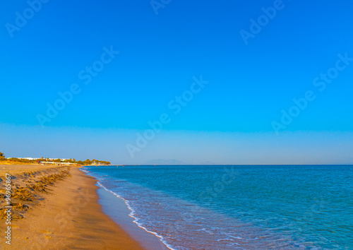 Fototapeta Naklejka Na Ścianę i Meble -  the beautiful long sandy beach at Chelona cape near Kardamaina village at Kos island in Greece