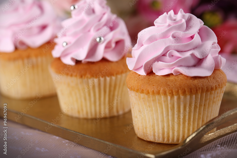 Tasty cupcakes on light background Tasty cupcakes on light background