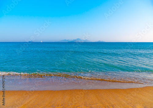 the beautiful long sandy beach at Chelona cape near Kardamaina village at Kos island in Greece