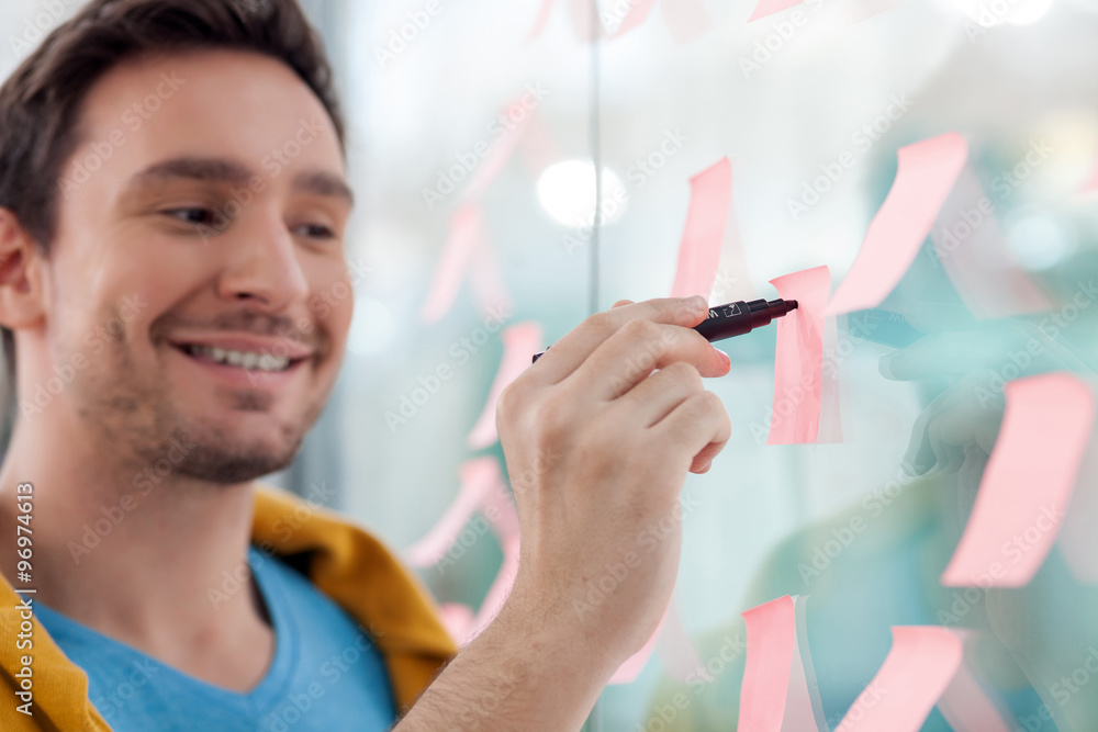 Attractive office worker is creating something new
