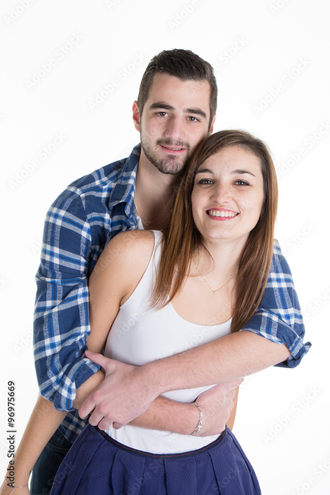 Young couple standing isolated on white background Young couple standing isolated on white background